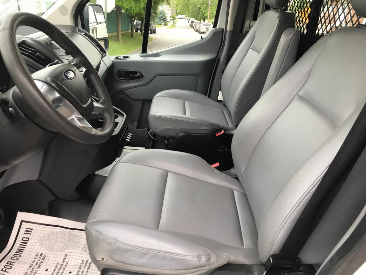 2018 White /Gray Ford Transit 150 (1FTYE1YM1JK) with an 3.7 V6 engine, Automatic transmission, located at 577 Chester Pike, Prospect Park, PA, 19076, (610) 237-1015, 39.886154, -75.302338 - 2018 Ford Transit 150: Dual drop down ladder racks, multiple pieces of shelving, power inverter w/ outlet, heavy duty partition, FLEET MAINTAINED, runs LIKE NEW! This vehicle comes inspected and has been given a bumper to bumper safety check. It is very clean, reliable, and well maintained. We of - Photo#9